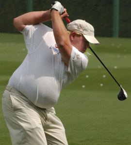 John Daly enjoying a cigarette mid-swing