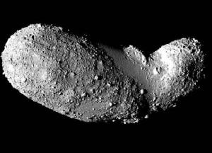 Asteroids, such as Itokawa, pictured here, are thought to be more like piles of rubble loosely clung together, than solid chunks of rock. Credit: ISAS/JAXA (Click for more info)