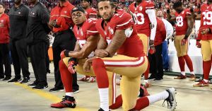 Colin Kaepernick and Eric Reid kneel during the national anthem prior to the 49ers' season opener.(Photo: Thearon W. Henderson, Getty Images)